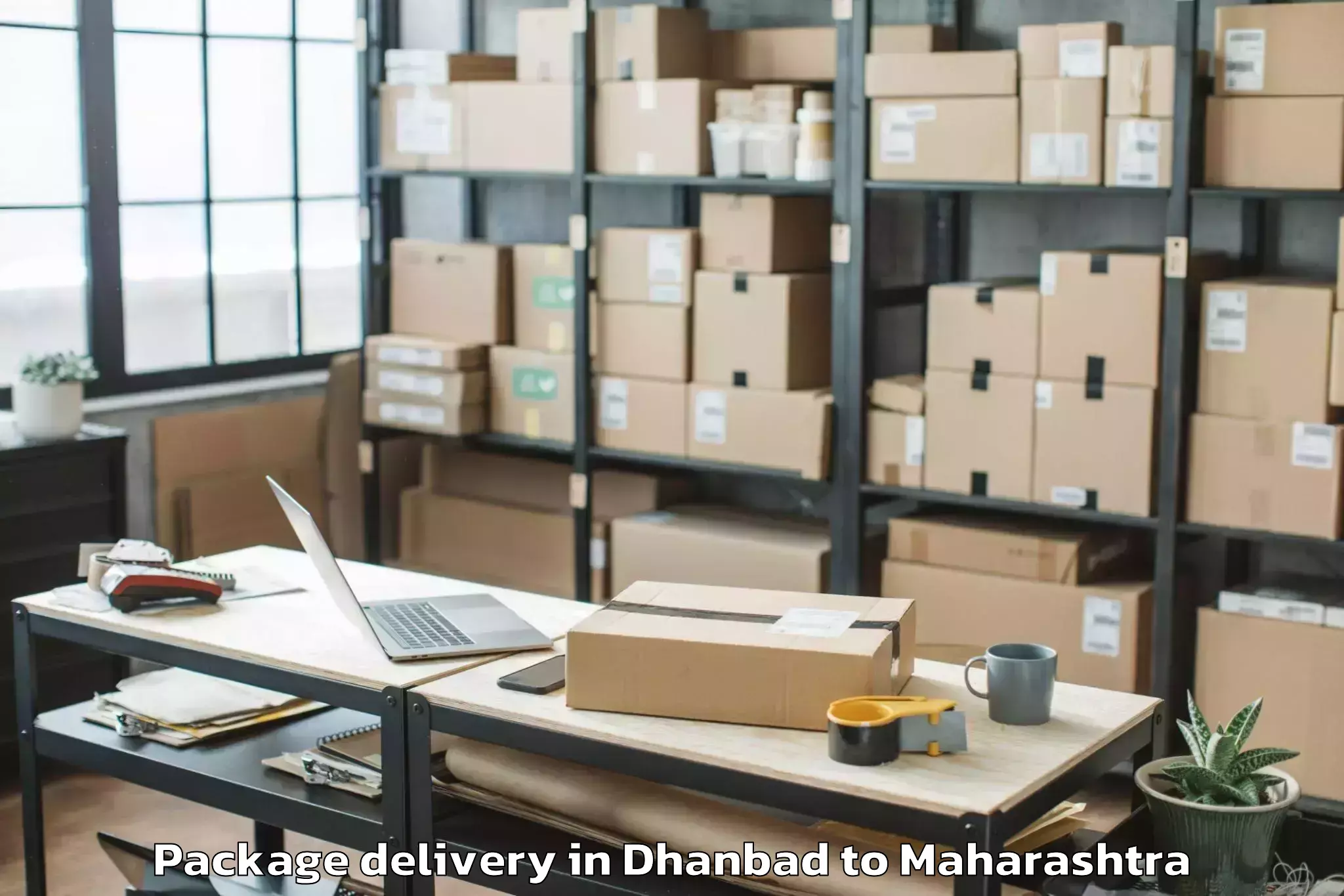 Trusted Dhanbad to Korpana Package Delivery